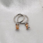 Tiny Emerald Cut Huggies image 0