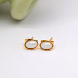 White Oval Studs image 0